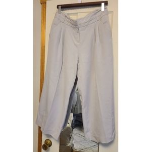 New York & Company cropped pant with pintuck style on the front near the waist.